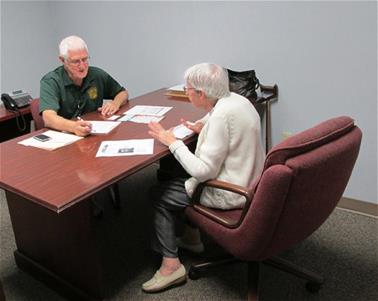 Seniors Vs Crime Seniors Vs Crime together at a desk